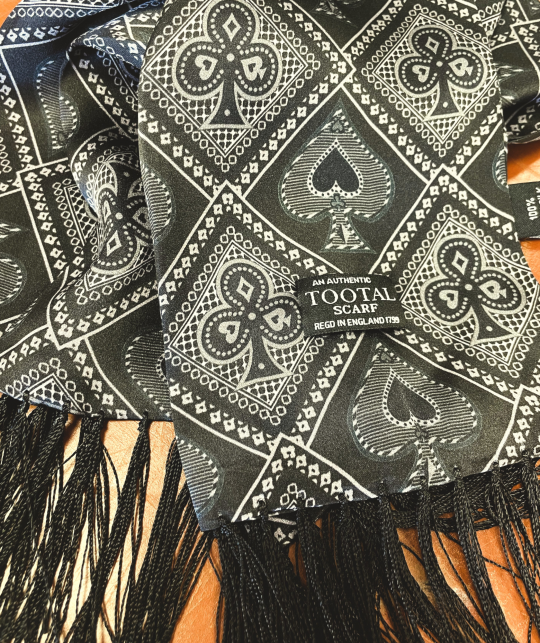 Tootal black silk scarf with Ace of Spades pattern and fringe ends, double-faced and made from 100% silk.