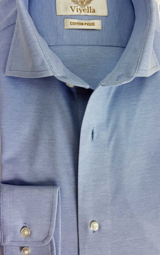 Viyella Knitted Piqué Sky Blue Shirt featuring a refined honeycomb texture and semi cutaway collar, crafted from soft, breathable cotton.